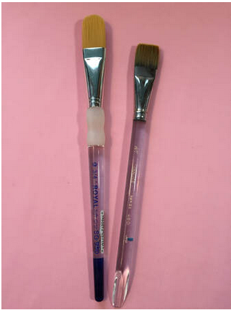 Choosing watercolor paintbrushes.